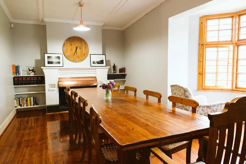 The meeting table and welcoming interior of the Machpesh Hilton office